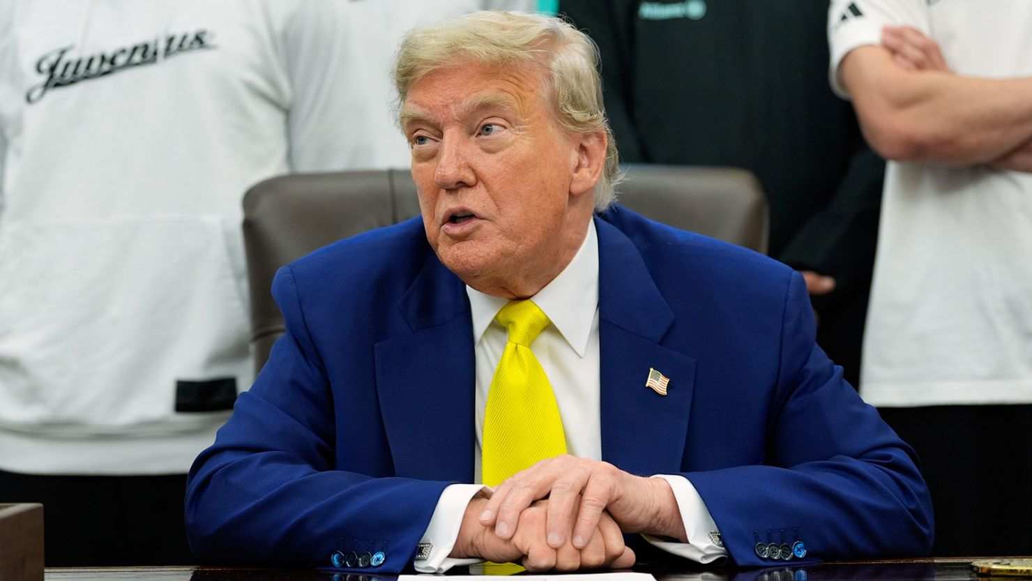President Donald Trump meets with members of the Juventus soccer club in the Oval Office on Wednesday.